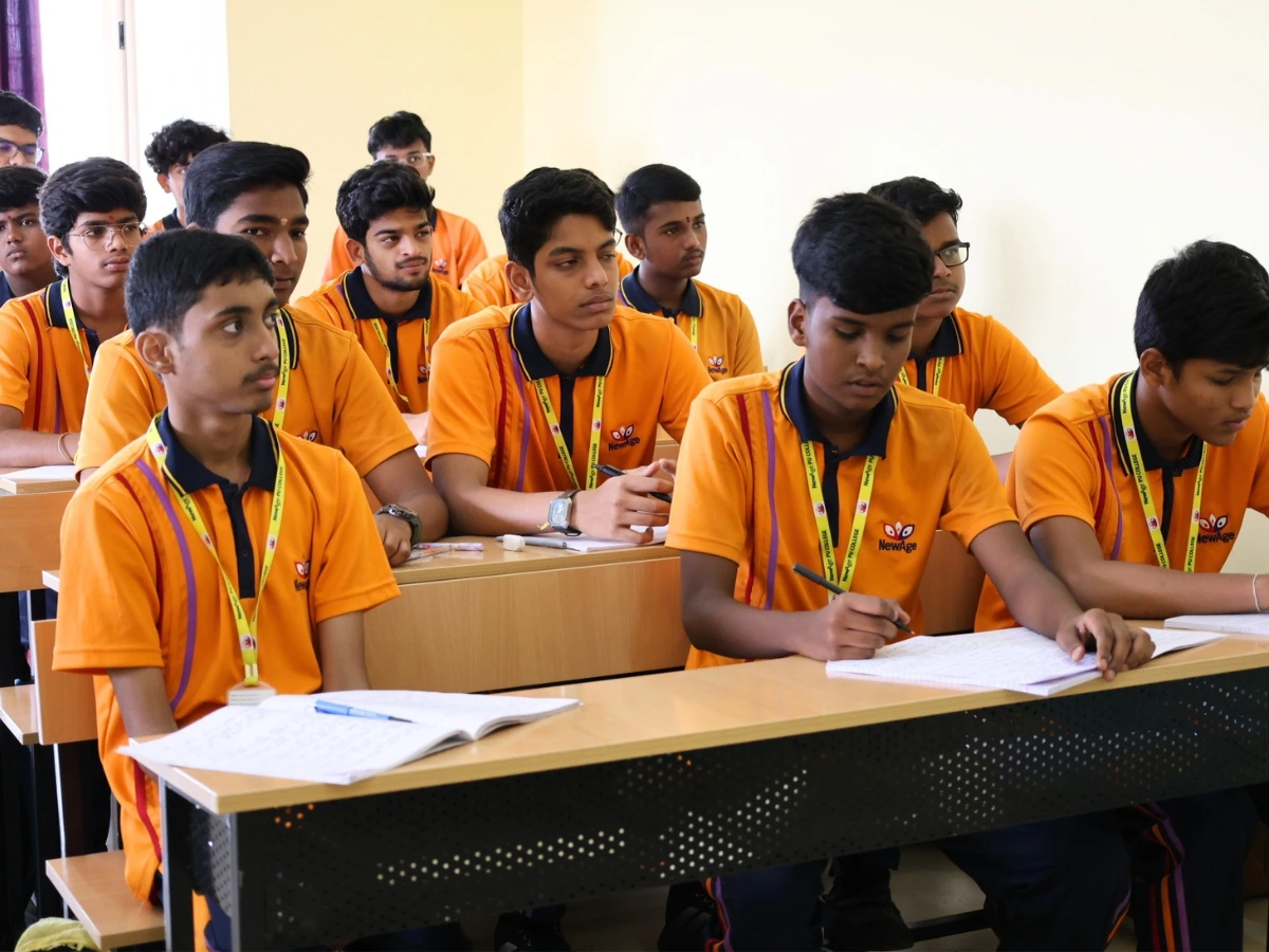 Students engaged in an interactive classroom session at NewAge PU College Yelahanka