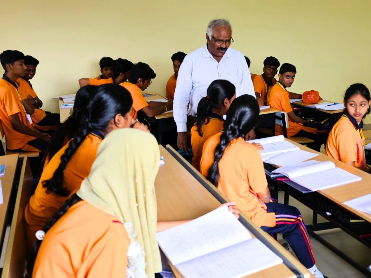 Students learning in a modern classroom at NewAge PU College